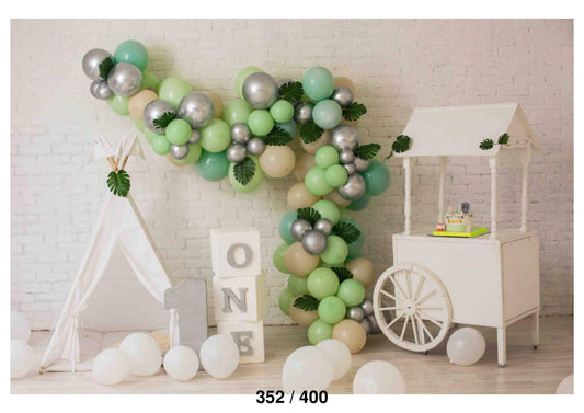 Cake Cart With Greenish Balloon Backdrop