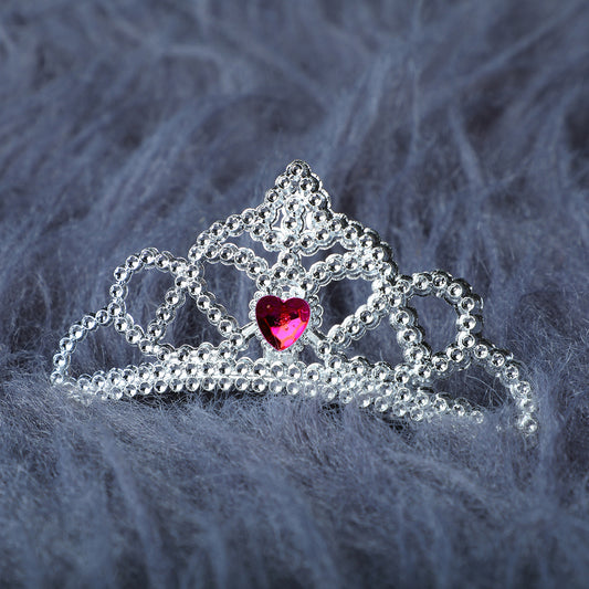 Silver crown with pink heart