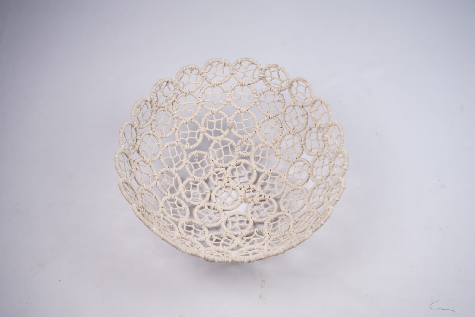 Neutral macrame newborn posing basket